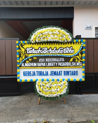 Papan Bunga Duka di Naga Huta